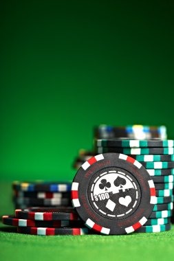 Slot game interface on mobile phone showing reels, spin button, and balance display